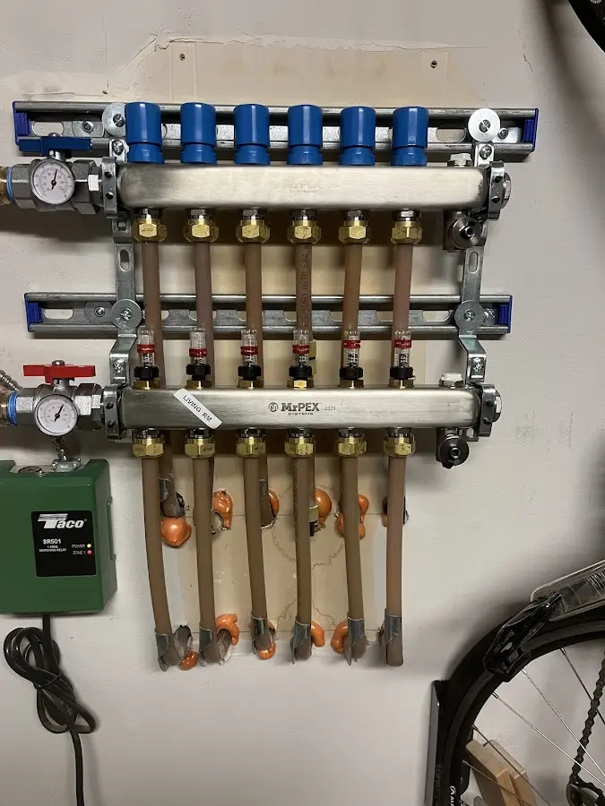 Plumber performing Gas Line Installation at a residential property in Huntington